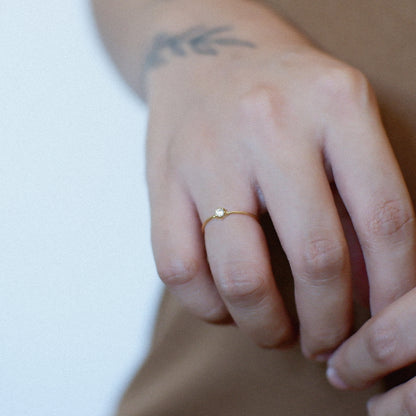 The Tiny Solitaire Birthstone Ring in Solid Gold