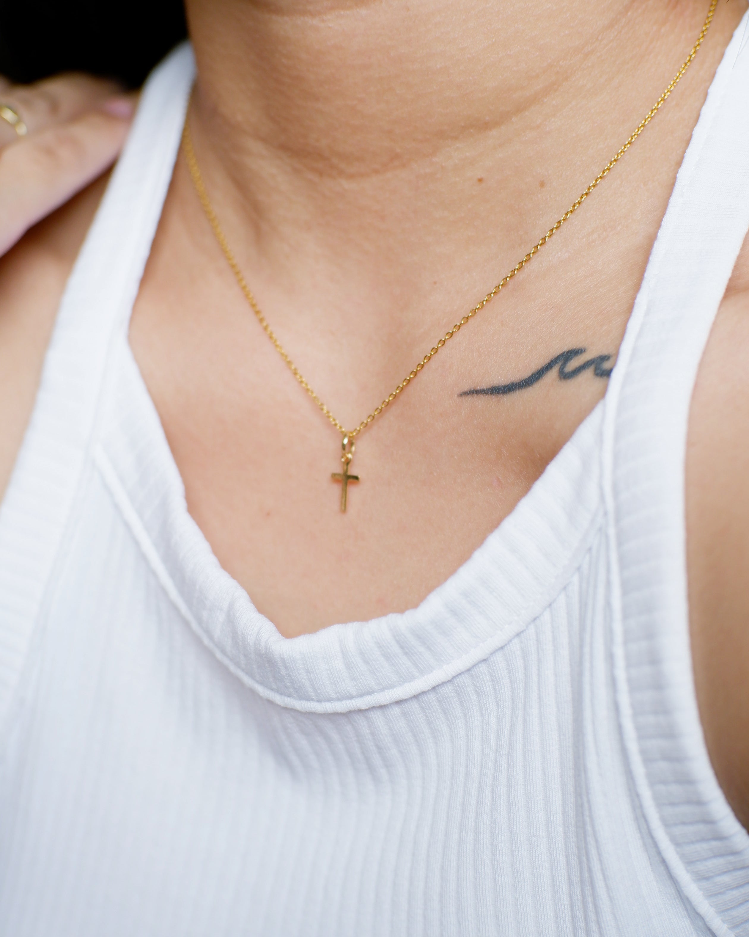 The Mini Cross Necklace in Solid Gold