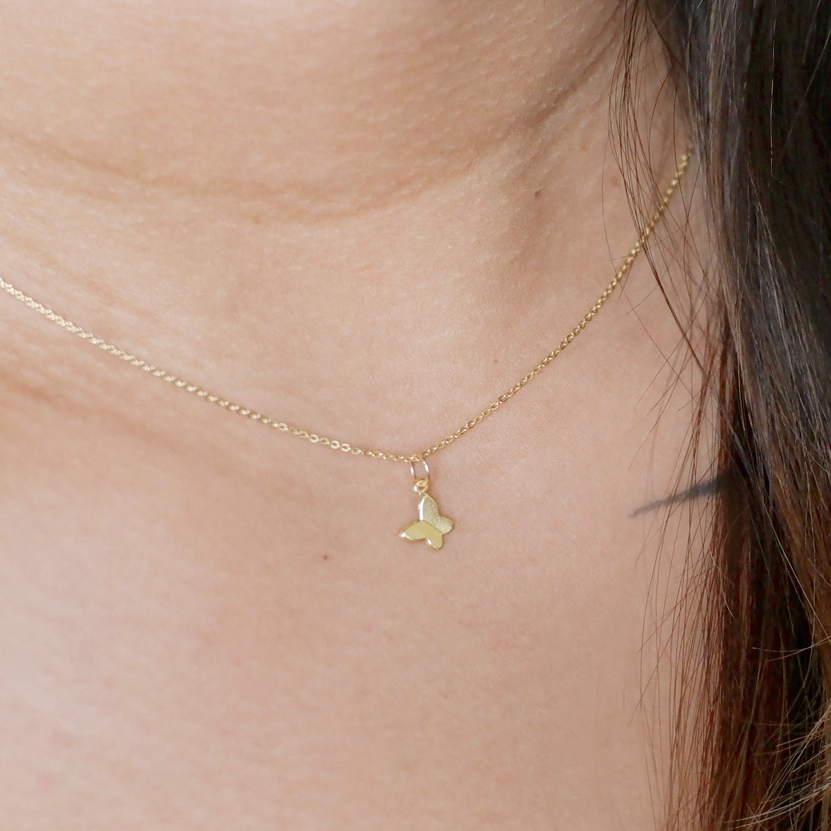 The Flat Butterfly Charm in Solid Gold