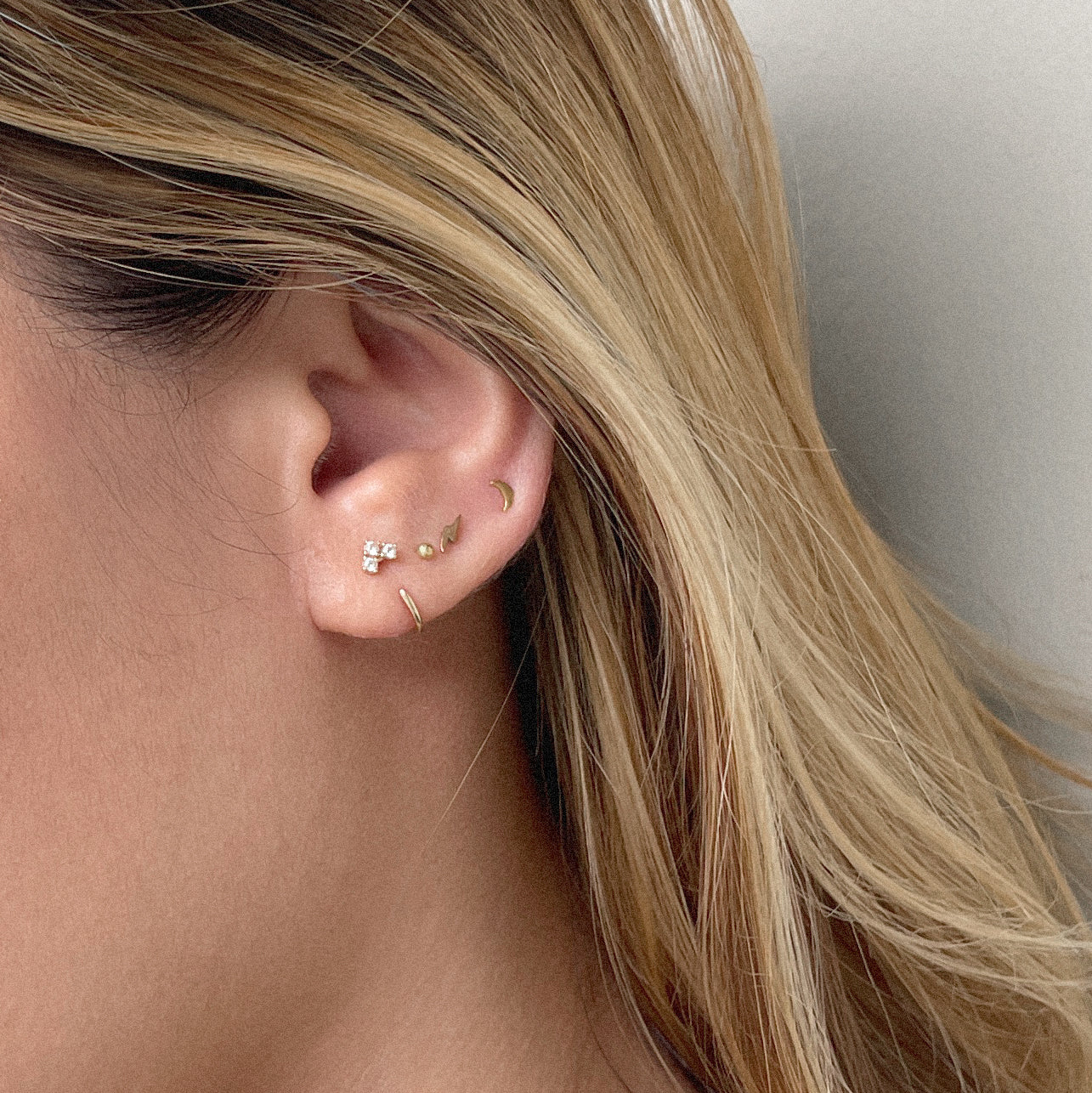 The Minimal Moon Studs in Solid Gold