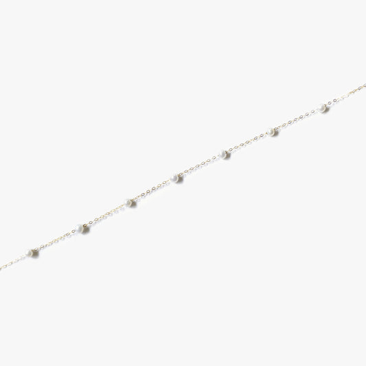 The Pearl Station Bracelet in Solid Gold