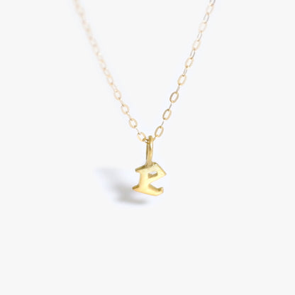 The Tiny Initial Pendant in Solid Gold