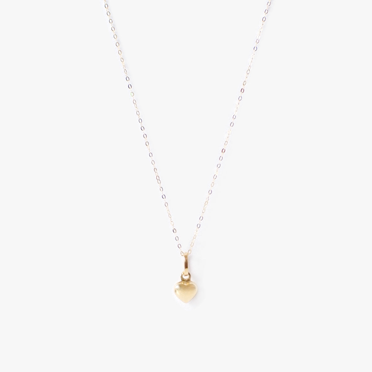 The Mini Heart Necklace in Solid Gold
