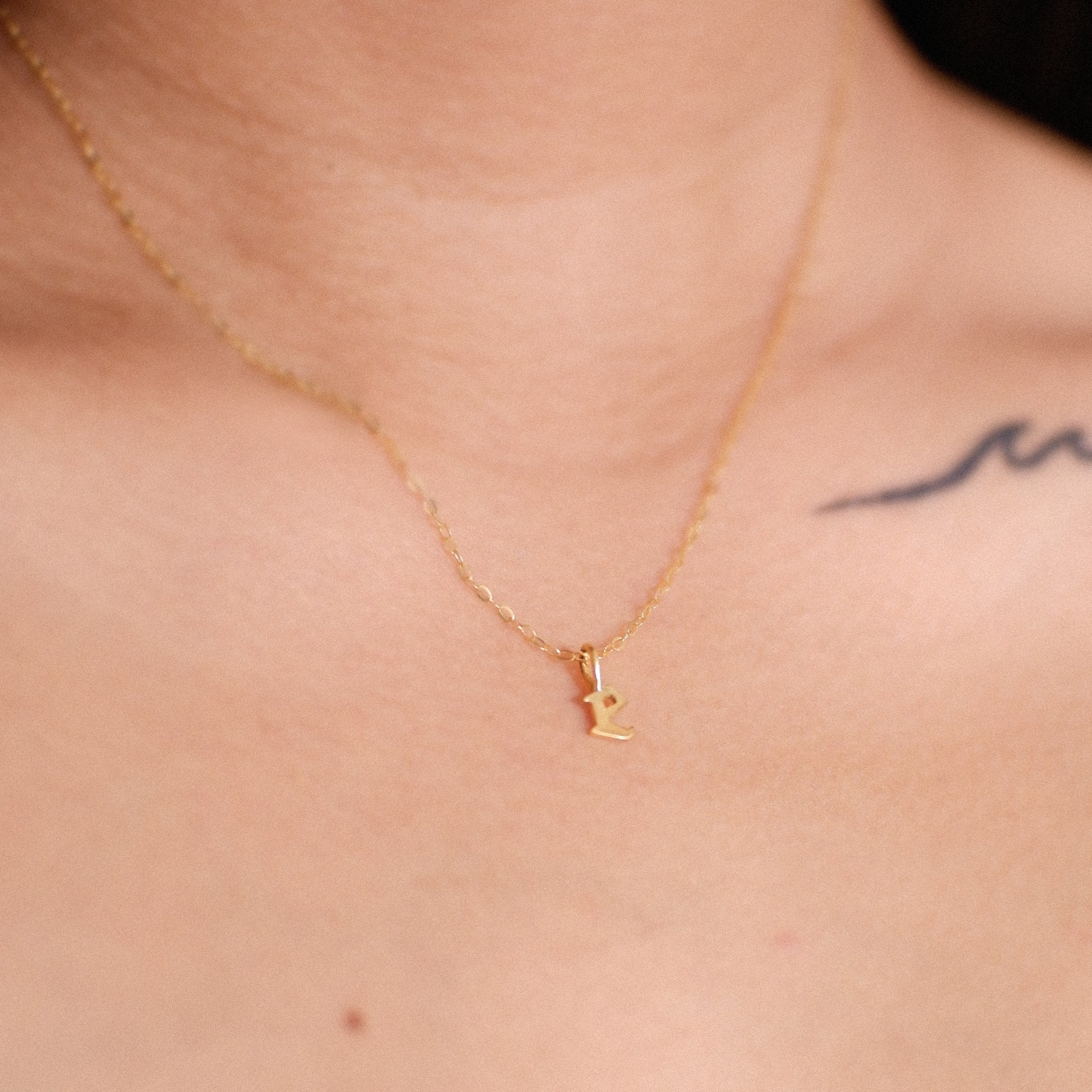 The Tiny Initial Pendant in Solid Gold