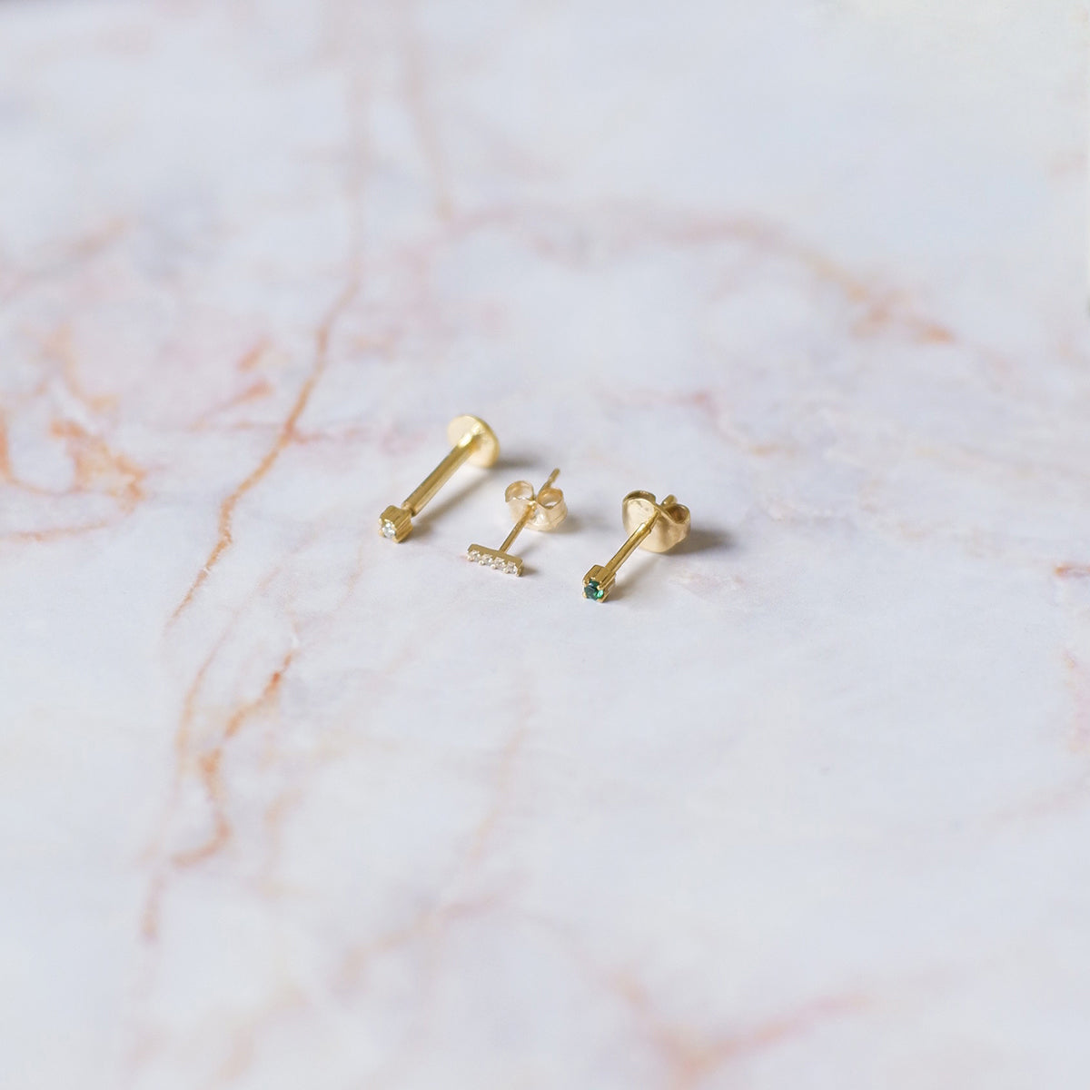 The Tiny Solitaire Birthstone Earrings in Solid Gold