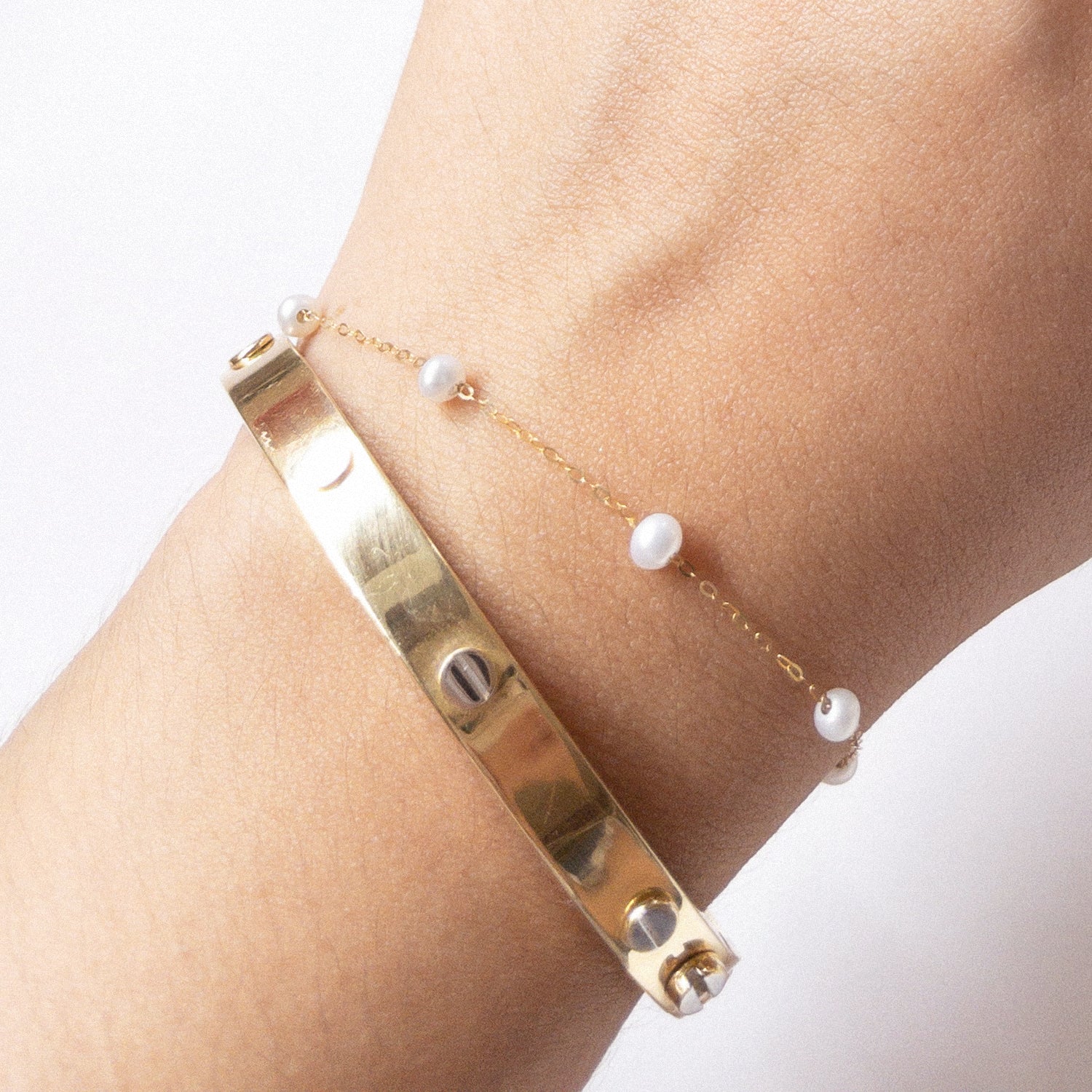 The Pearl Station Bracelet in Solid Gold