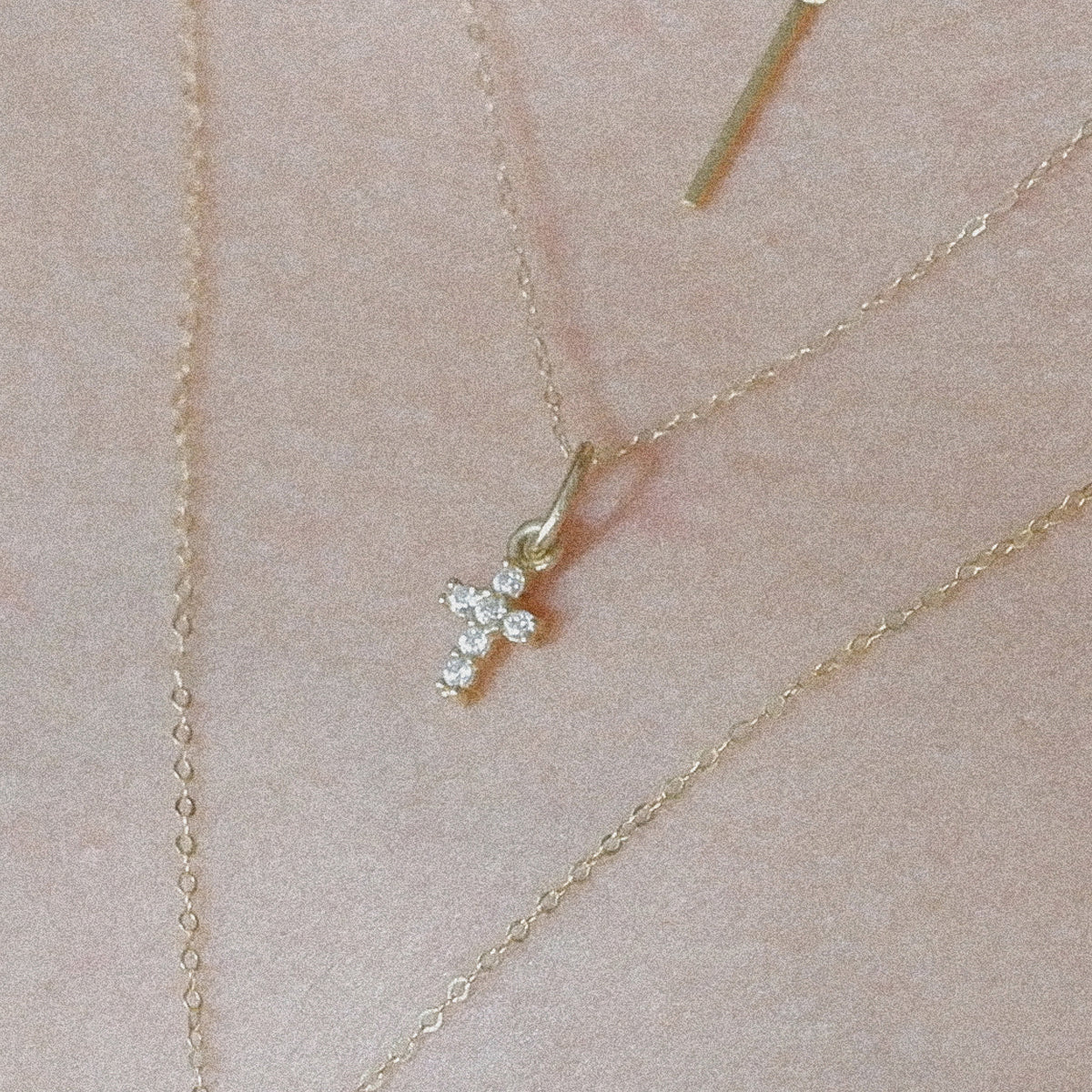 The Tiny Pavé Cross Necklace in Solid Gold