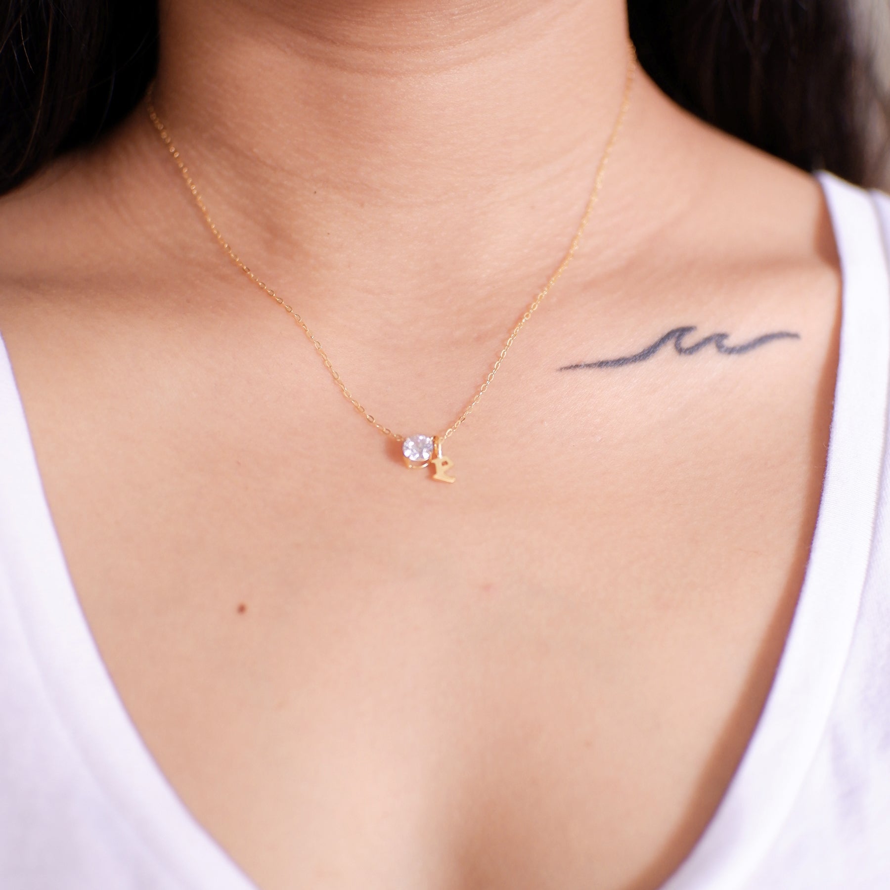 The Tiny Initial Pendant in Solid Gold