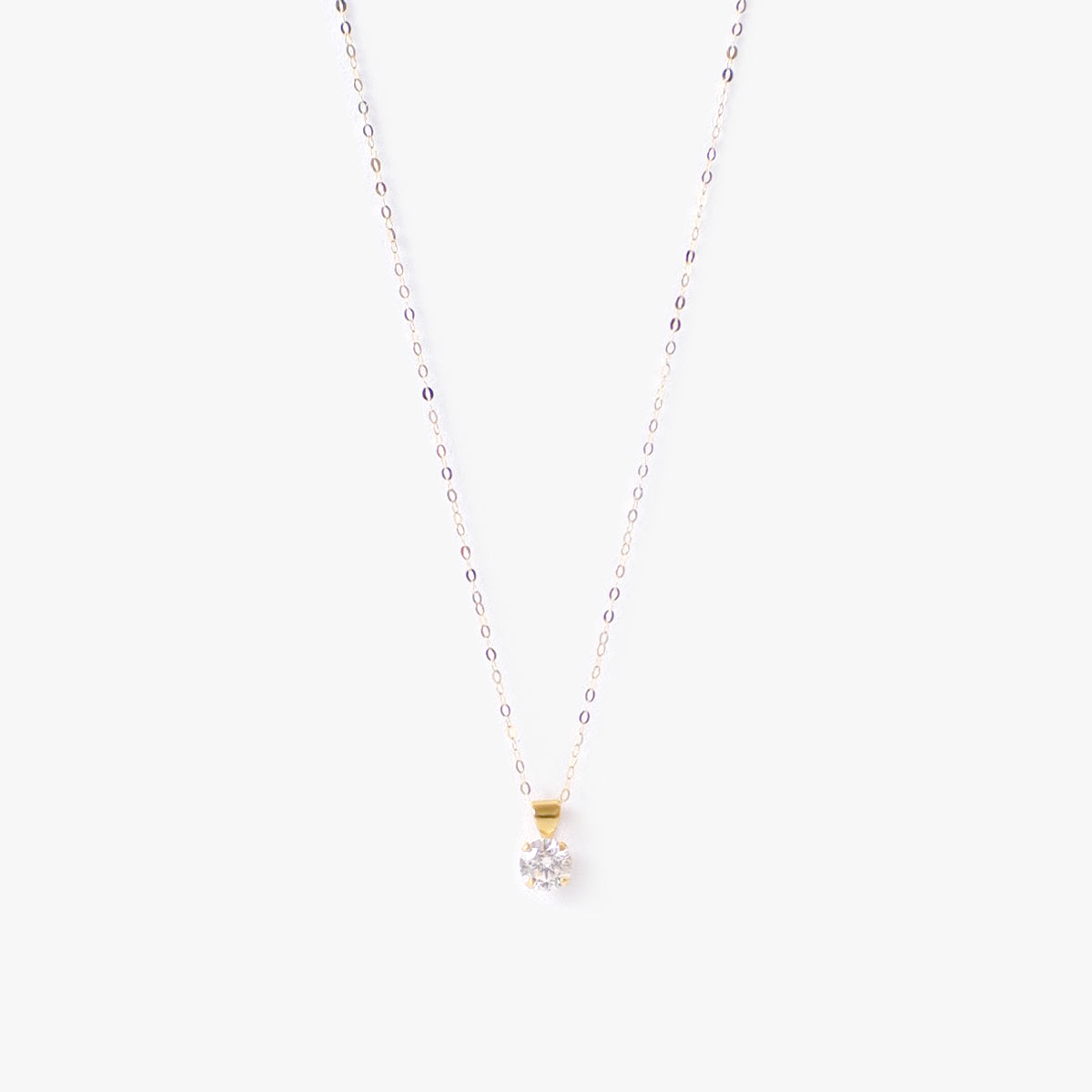 The Mini Solitaire Necklace in Solid Gold