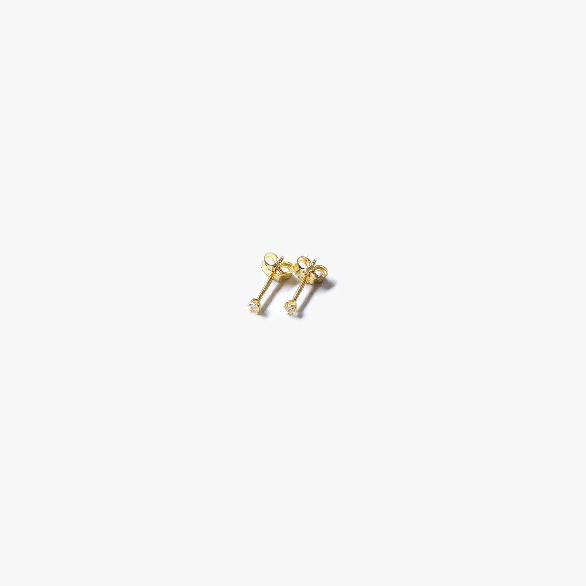 The Ultra Tiny Solitaire Earrings in Solid Gold